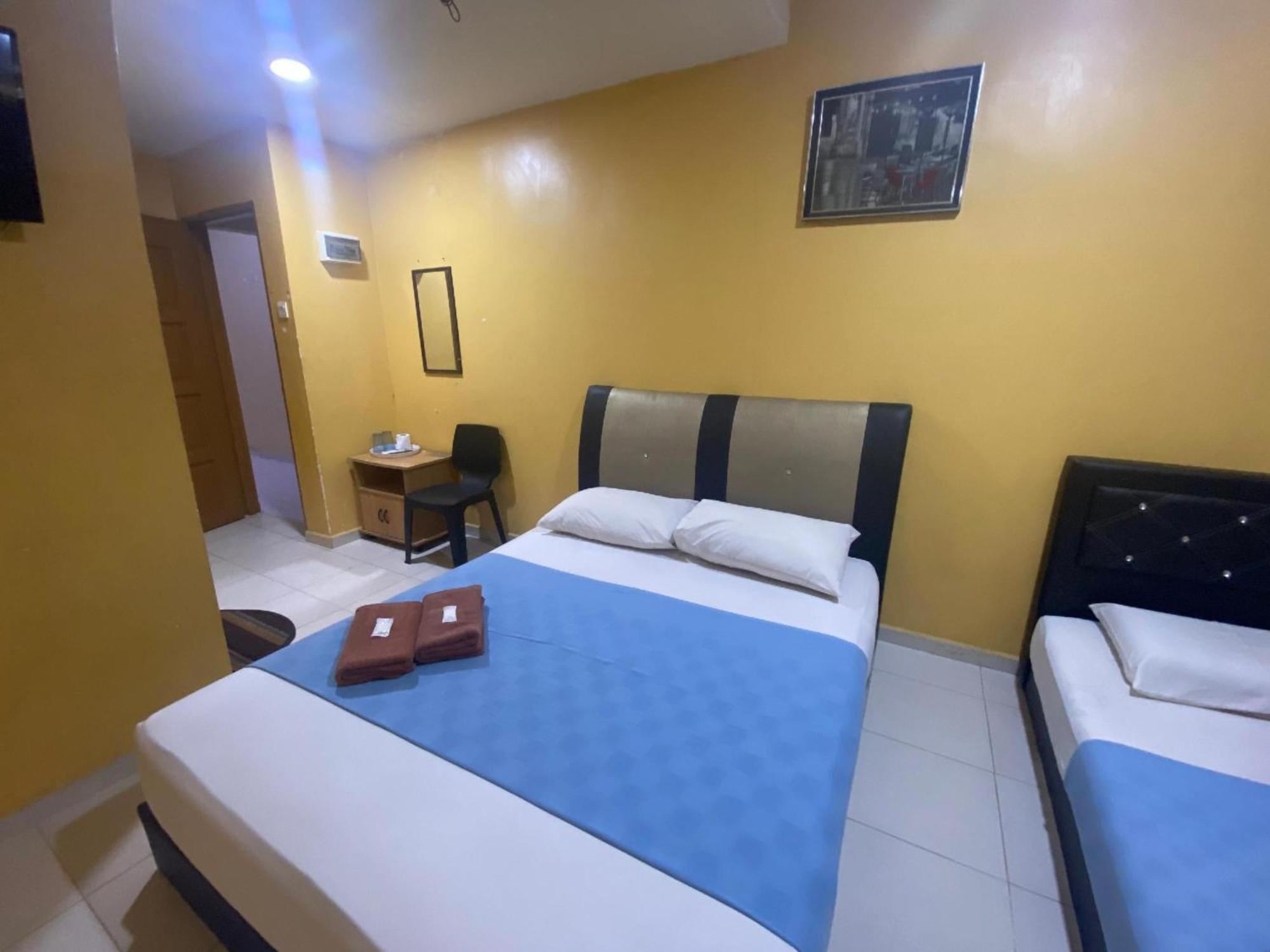 Oyo 91065 Hotel De Anjung Muadzam Shah Bagian luar foto